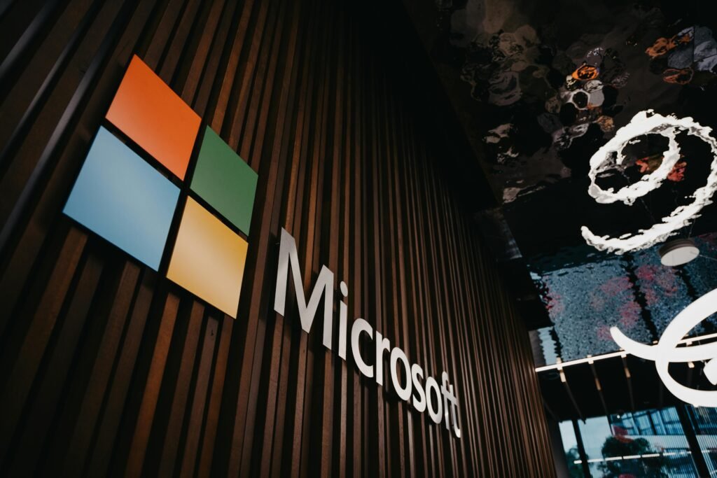pexels photo 10142683 10142683 1 Interior view of Microsoft office with logo on wooden wall in Brussels, Belgium.